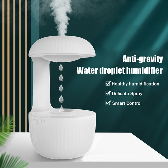 White anti-gravity humidifier releasing mist while water droplets appear to float upward