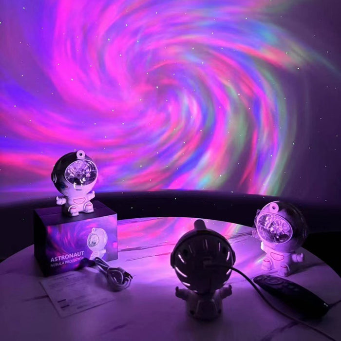 Astronaut nebula projectors casting swirling purple and pink galaxy light across a dark room
